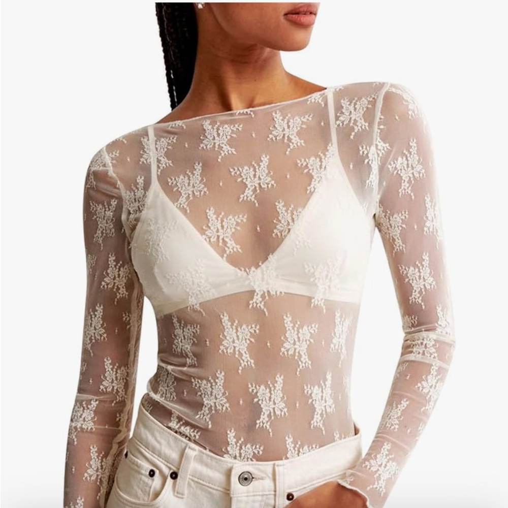 Elegant white Lace Sheer Top great for layering. Shout out to free people